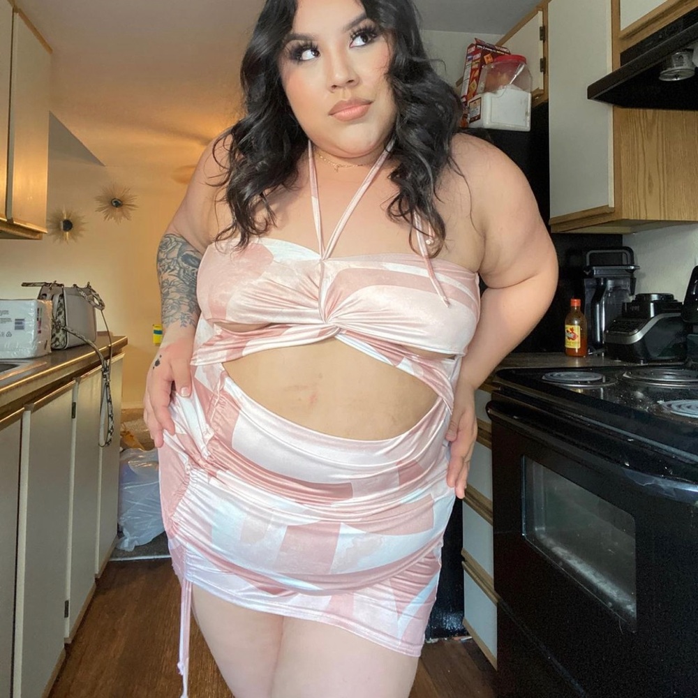 Pretty little thing's pink dress